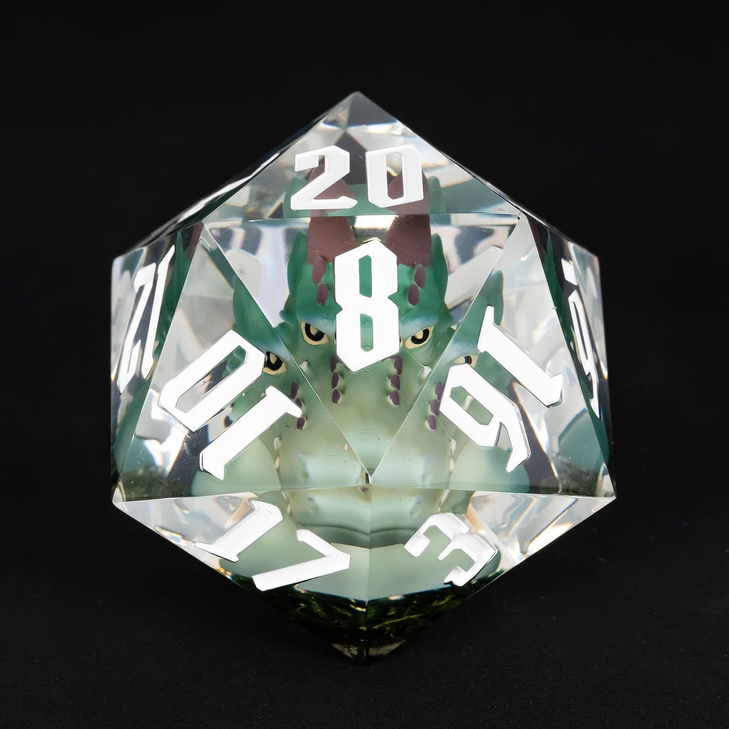 Oversized green kobold resin D20 with white numbering for DnD display dice