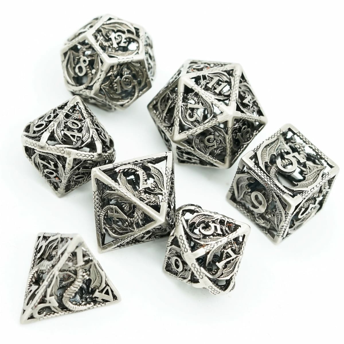 Full 7-piece Ancient Silver Dragon hollow metal dice set for DND and TTRPG tabletop gaming