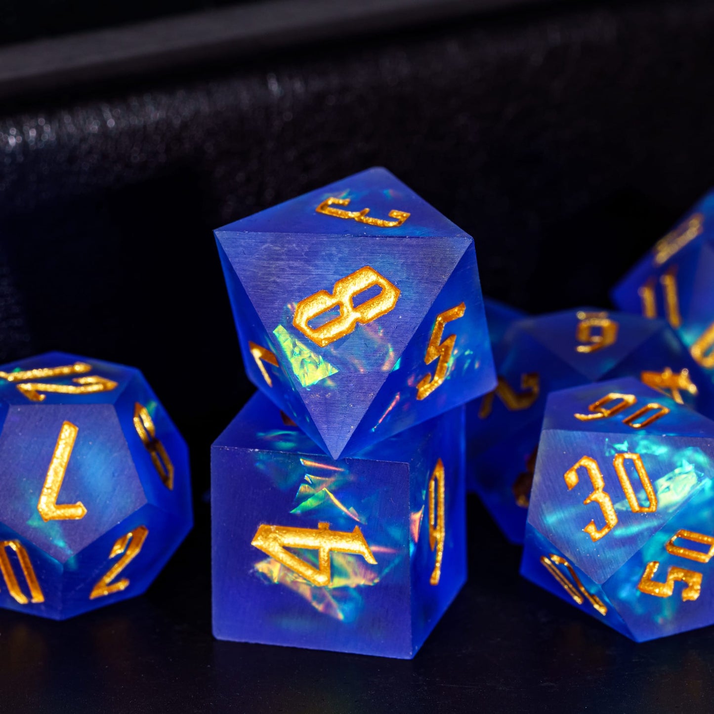 Azure Abyss Sharp Edge Dice Set stacked display with glowing blue resin for DnD & DnD 5e