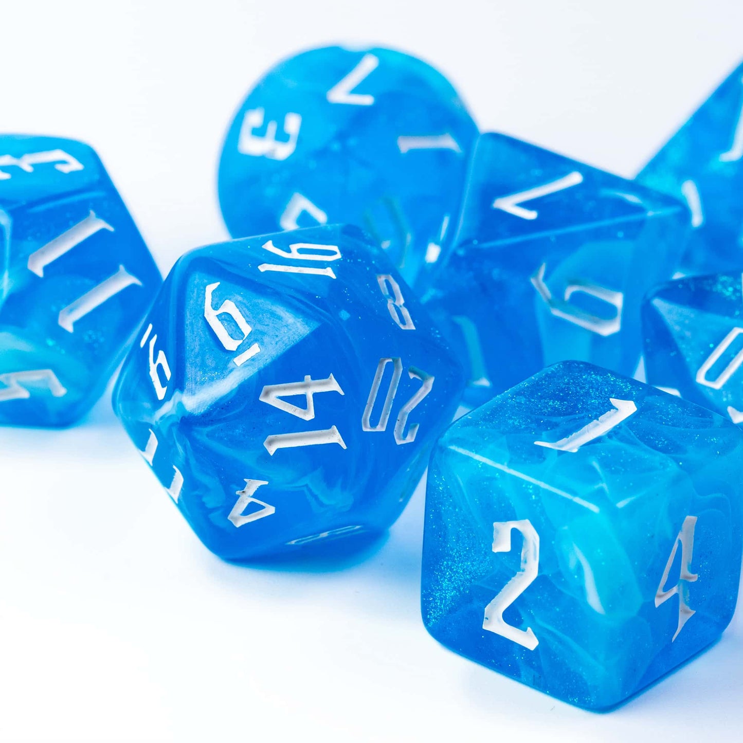 Blue Ice Dice Set crystal blue resin polyhedral dice with white numbers for DnD & TTRPG