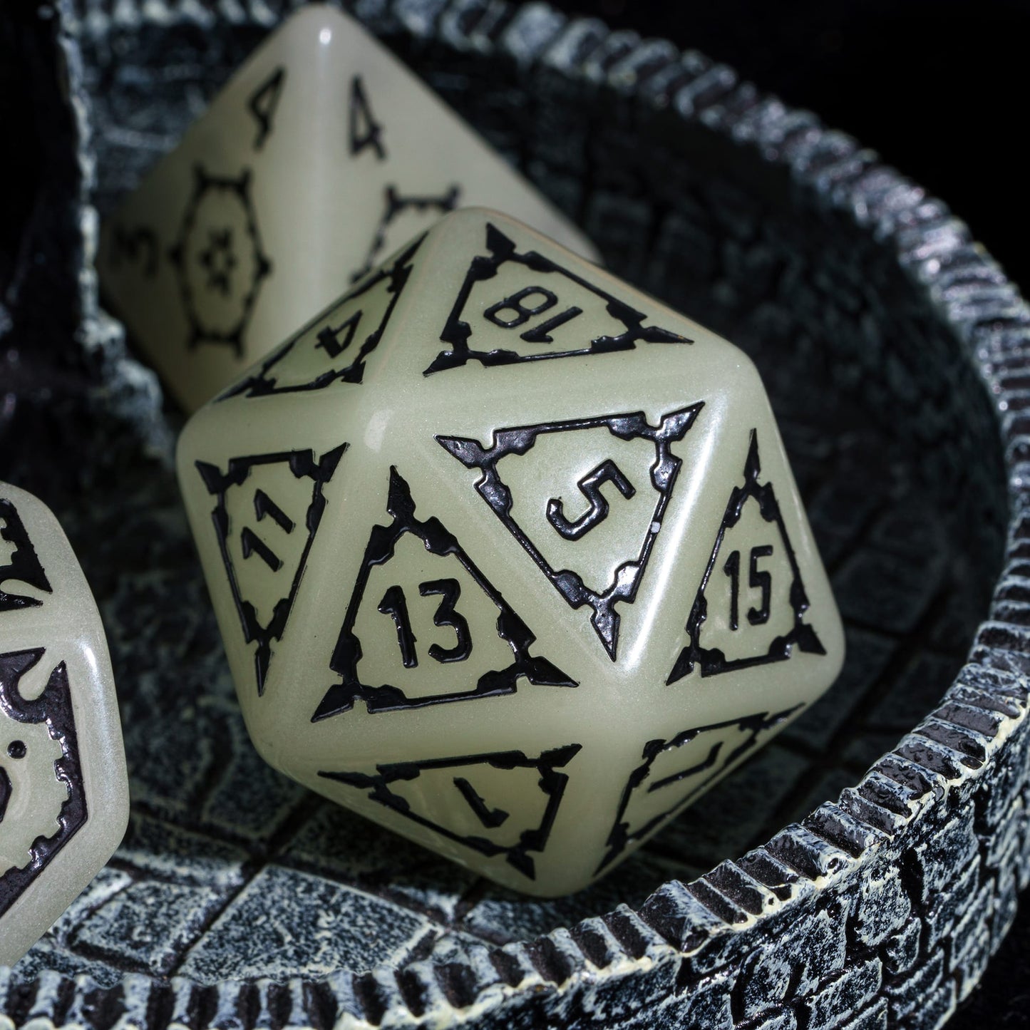 Castle Glow & Black Huge Dice Set closeup of D20 with ornate black numbering for DnD & DnD 5e