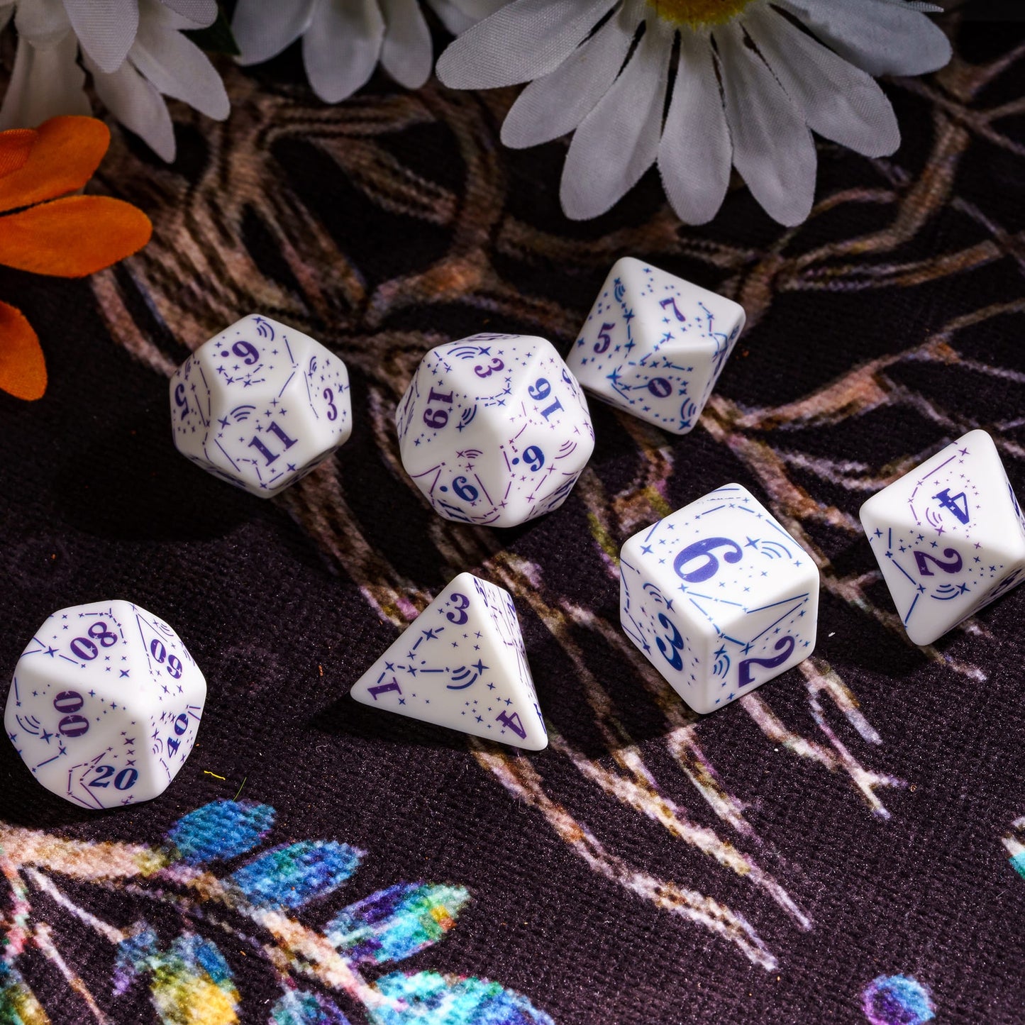 Scattered Celestial Symphony Dice Set showing detailed constellation engravings for DnD & DnD 5e