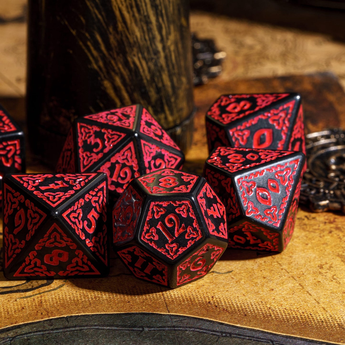 Close-up of Celtic Knot Dice Set in black & red showing engraved knotwork, 7 piece dice for DND & DND 5e