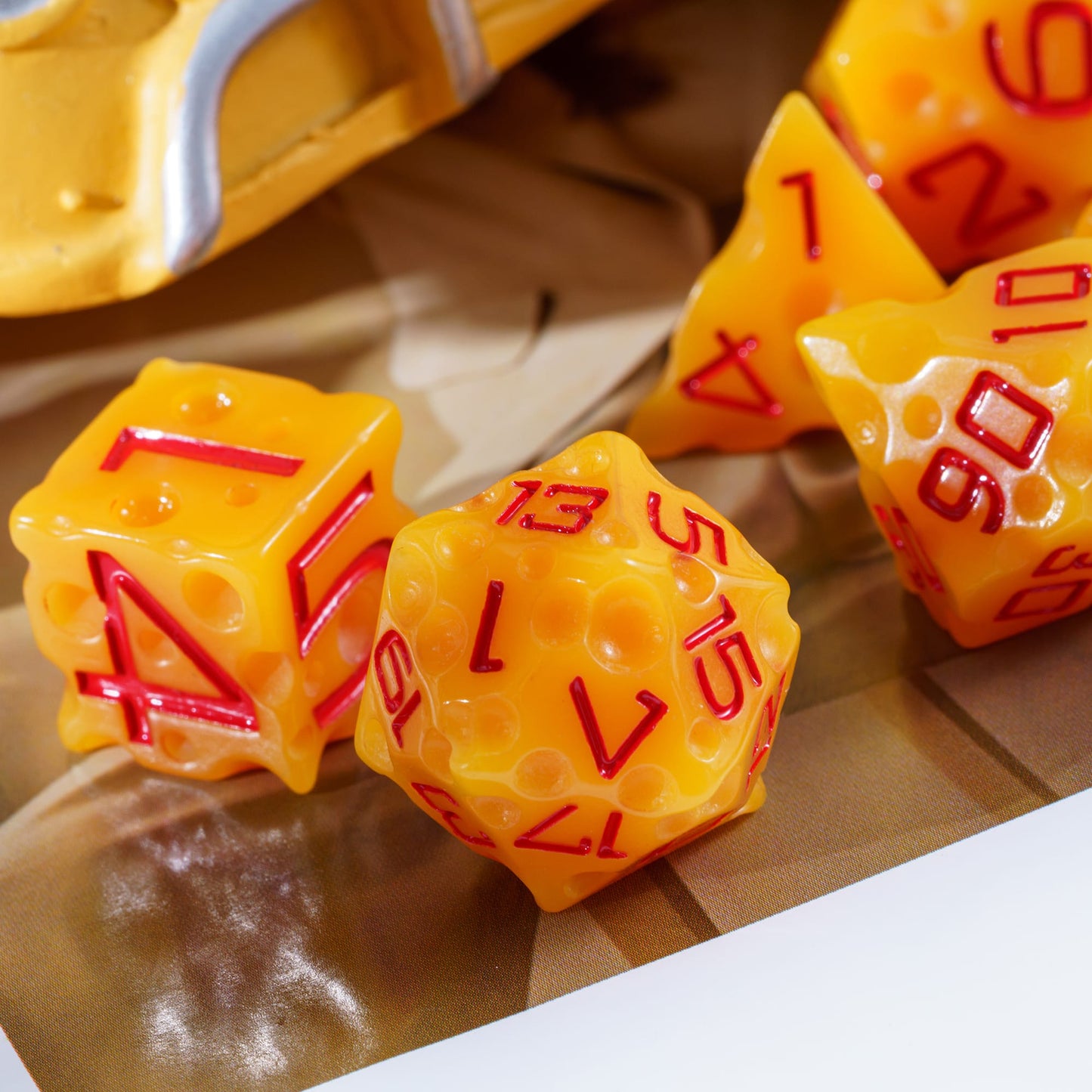 Close-up of Cheese Dice Set, yellow D20 and D6 with red numbering for DnD & DnD 5e