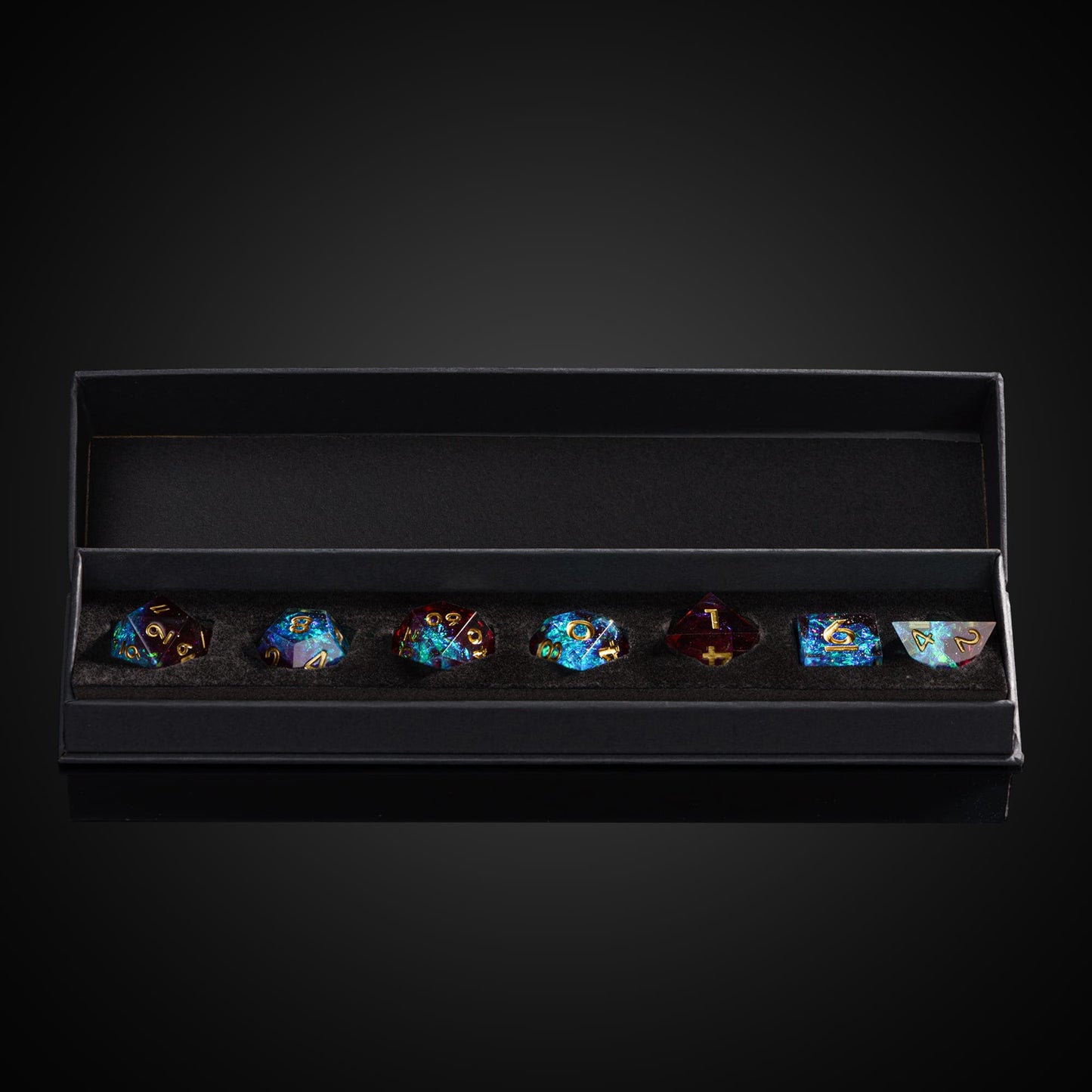 Open Only Crits black dice case displaying Corrupted Cobalt sharp edge polyhedral set