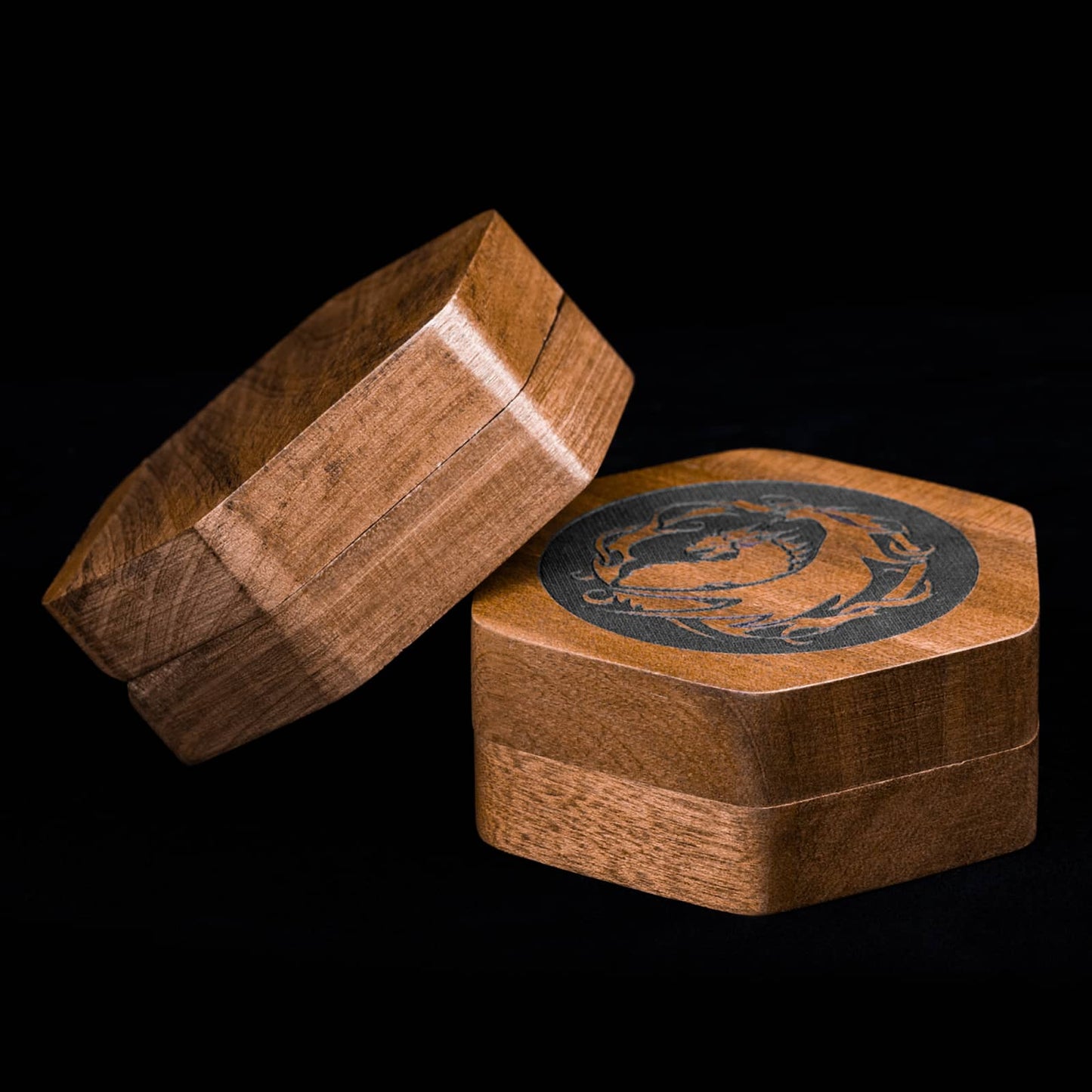 Top view of Embercoil Vault black walnut dice case with dragon design