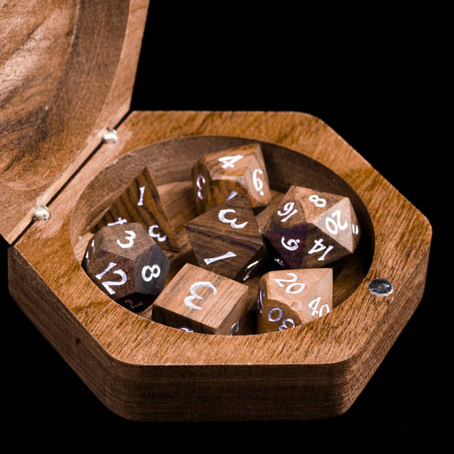 Open Embercoil Vault black walnut dice storage box holding polyhedral dice set