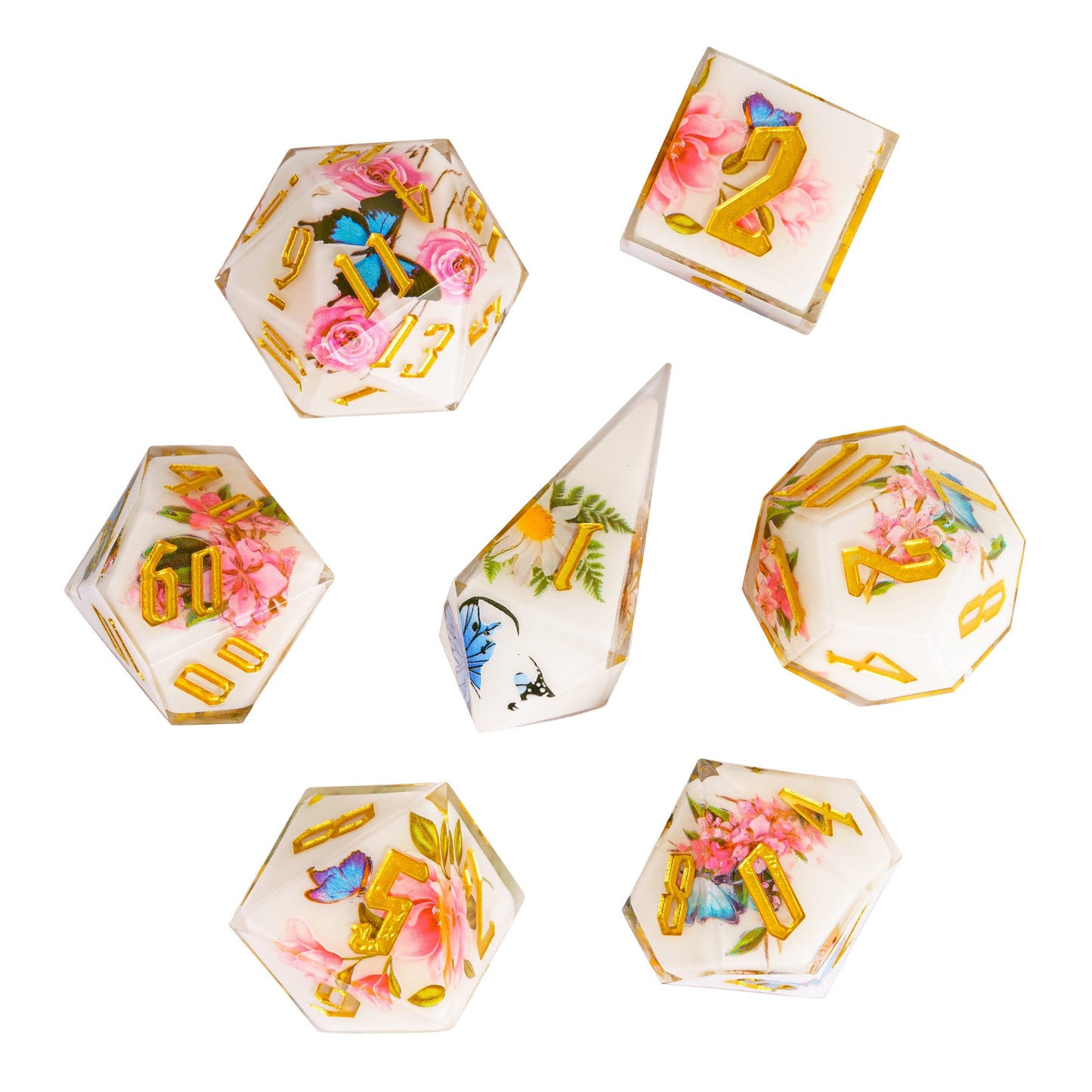 Floral Radiance Sharp Edge Dice Set floating layout showing ivory resin dice with pink roses, butterflies, and metallic gold engraved numbers for DnD and tabletop RPG