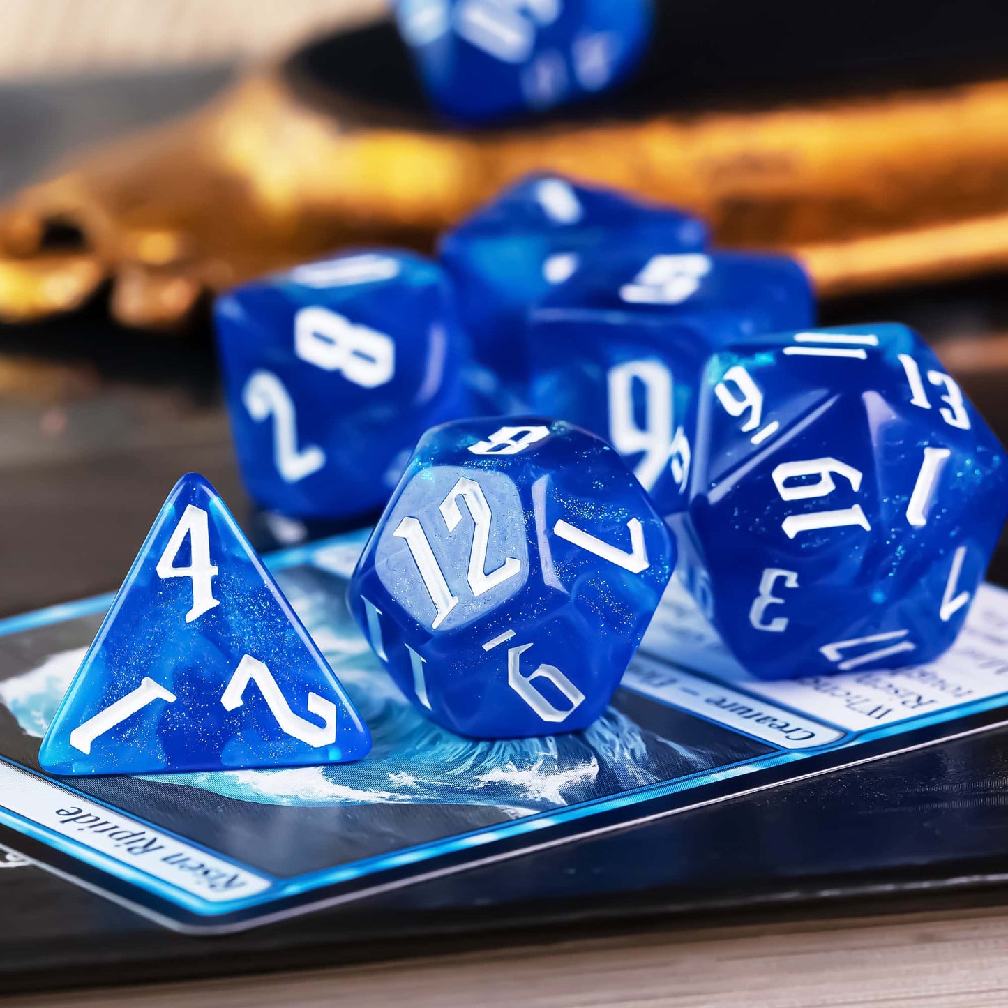 Glacier Blue Dice Set shimmering resin polyhedral dice on trading card background for DnD