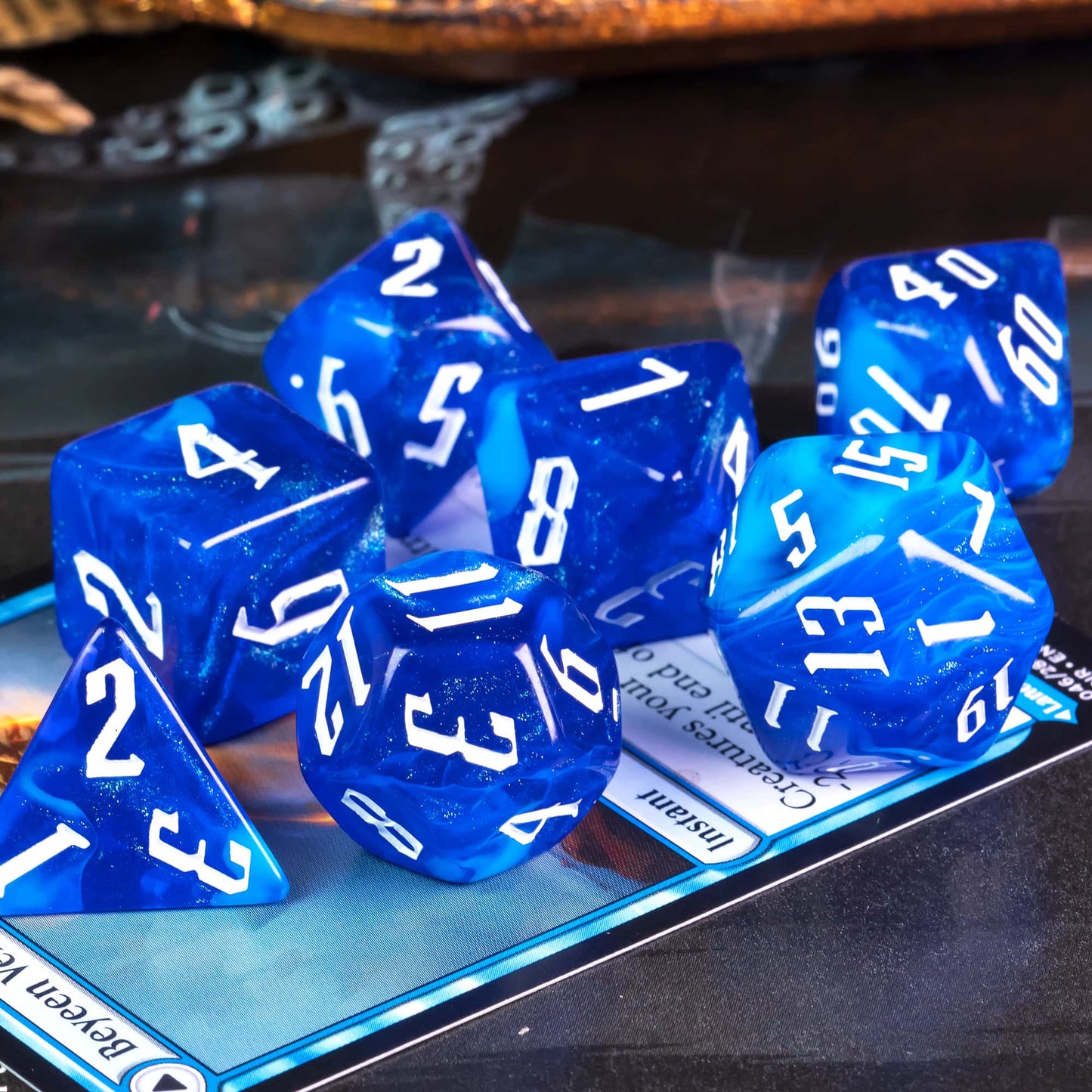 Glacier Blue Dice Set shimmering resin polyhedral dice on table background for DnD