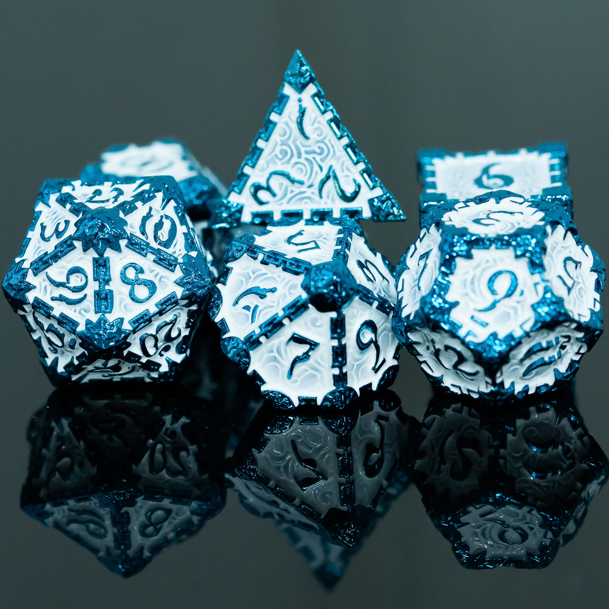 Icy Blade metal dagger dice set for DnD & TTRPG, front view with reflection