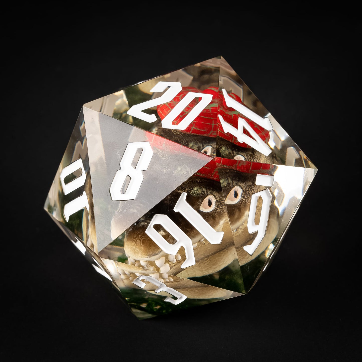 Oversized red gator resin D20 with white numbering for DnD display dice