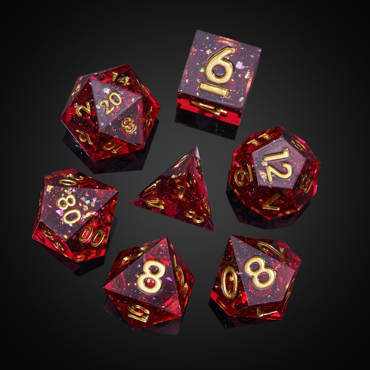 Magma Flake Sharp Edge Dice Set, 7 piece red resin dice with gold numbering arranged for DnD & DnD 5e