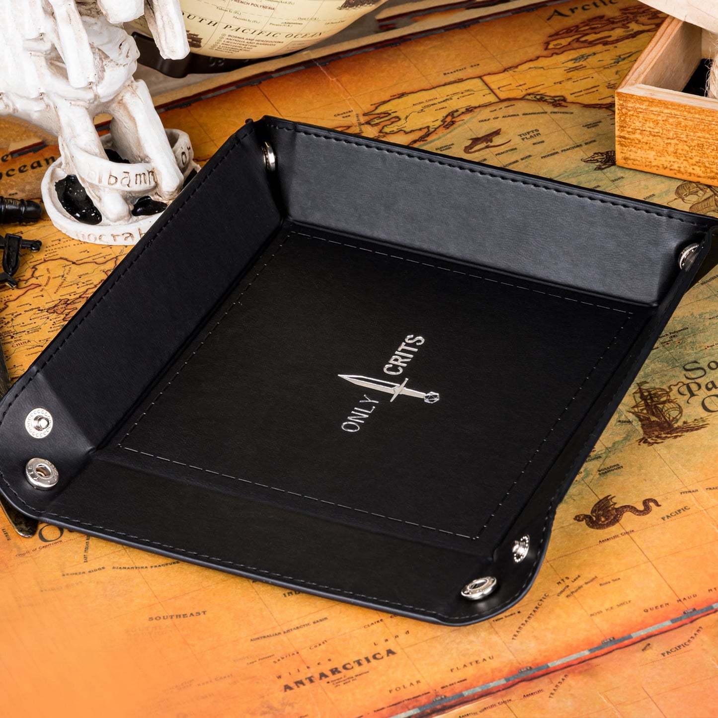 Angled shot of black Only Crits Dice Tray with logo, premium tabletop RPG dice rolling tray