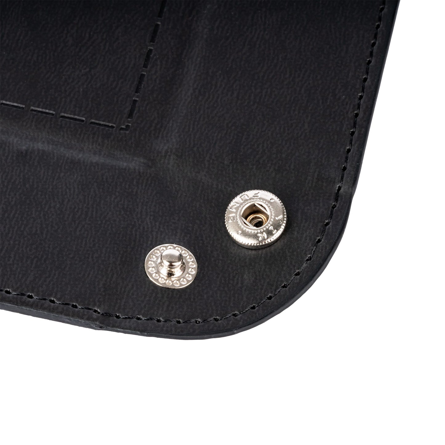 Closeup of silver snap button on Only Crits Dice Tray, foldable RPG dice rolling tray detail