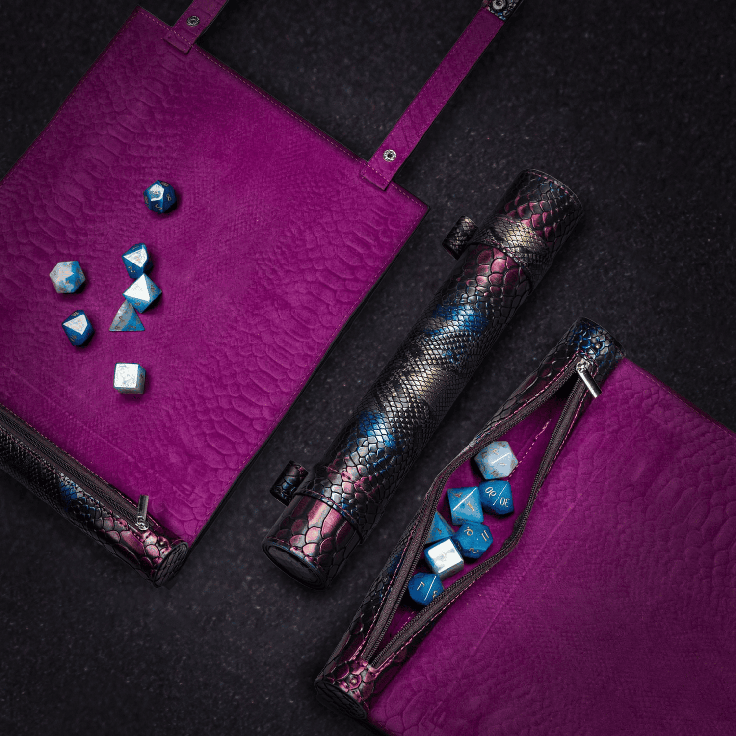 Full dice accessory set including a textured scroll case, purple dice mat, and matching zip pouch with blue dice, designed by Only Crits.
