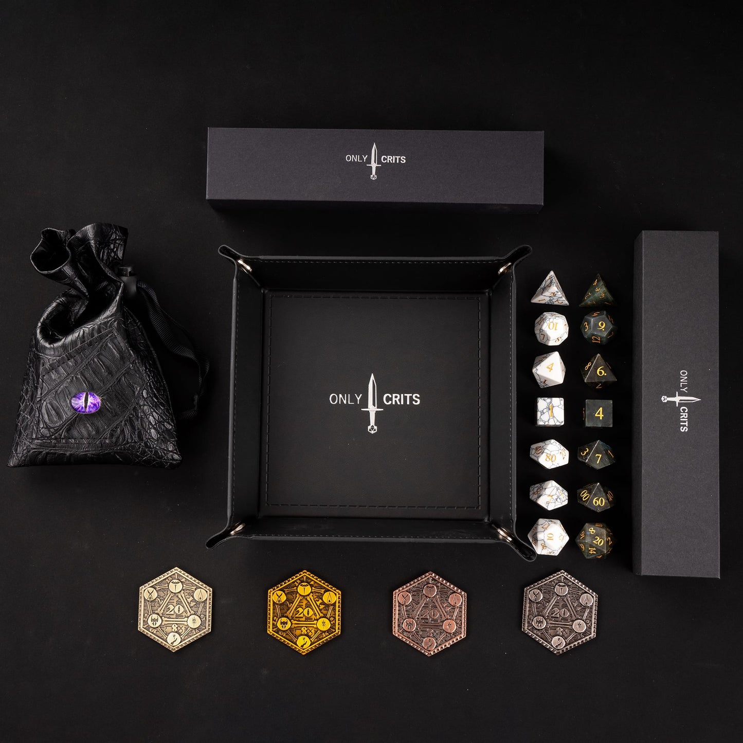 Collector edition Stone Dice Bundle with handcrafted stone dice sets and Only Crits accessories displayed on black background
