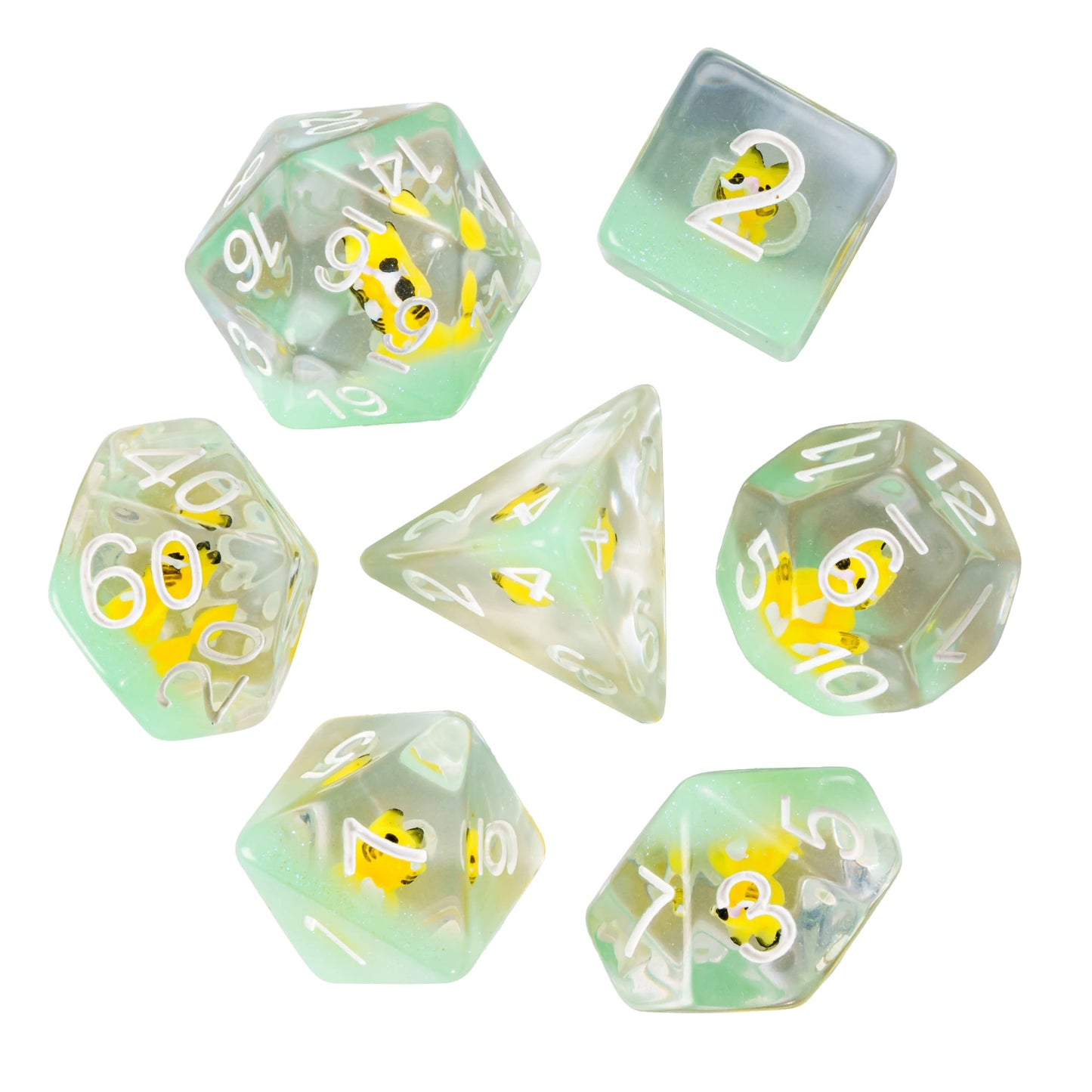 Flat lay of Transparent Yellow Cat Dice Set with seven resin dice and embedded cat miniatures.