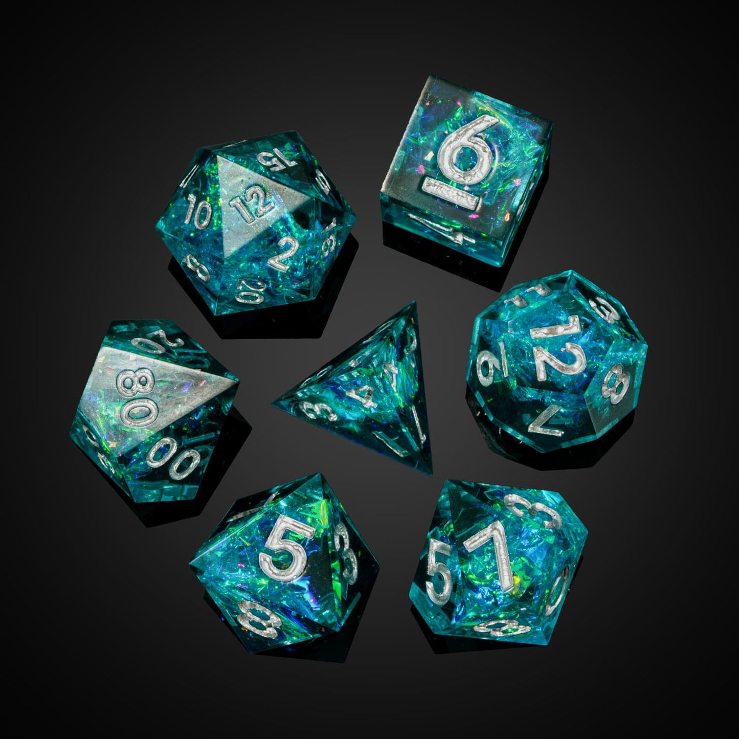 Top view flat lay of Turquoise Soul sharp edge dice set with vibrant turquoise resin and silver numbering