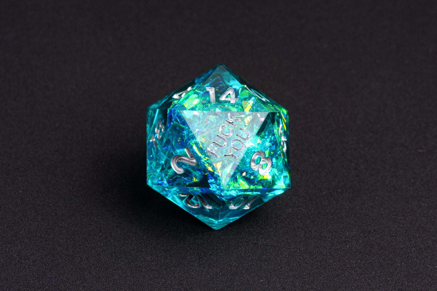 Display of Turquoise Soul Sharp Edge F*ck You Dice Set with shimmering turquoise & silver tones