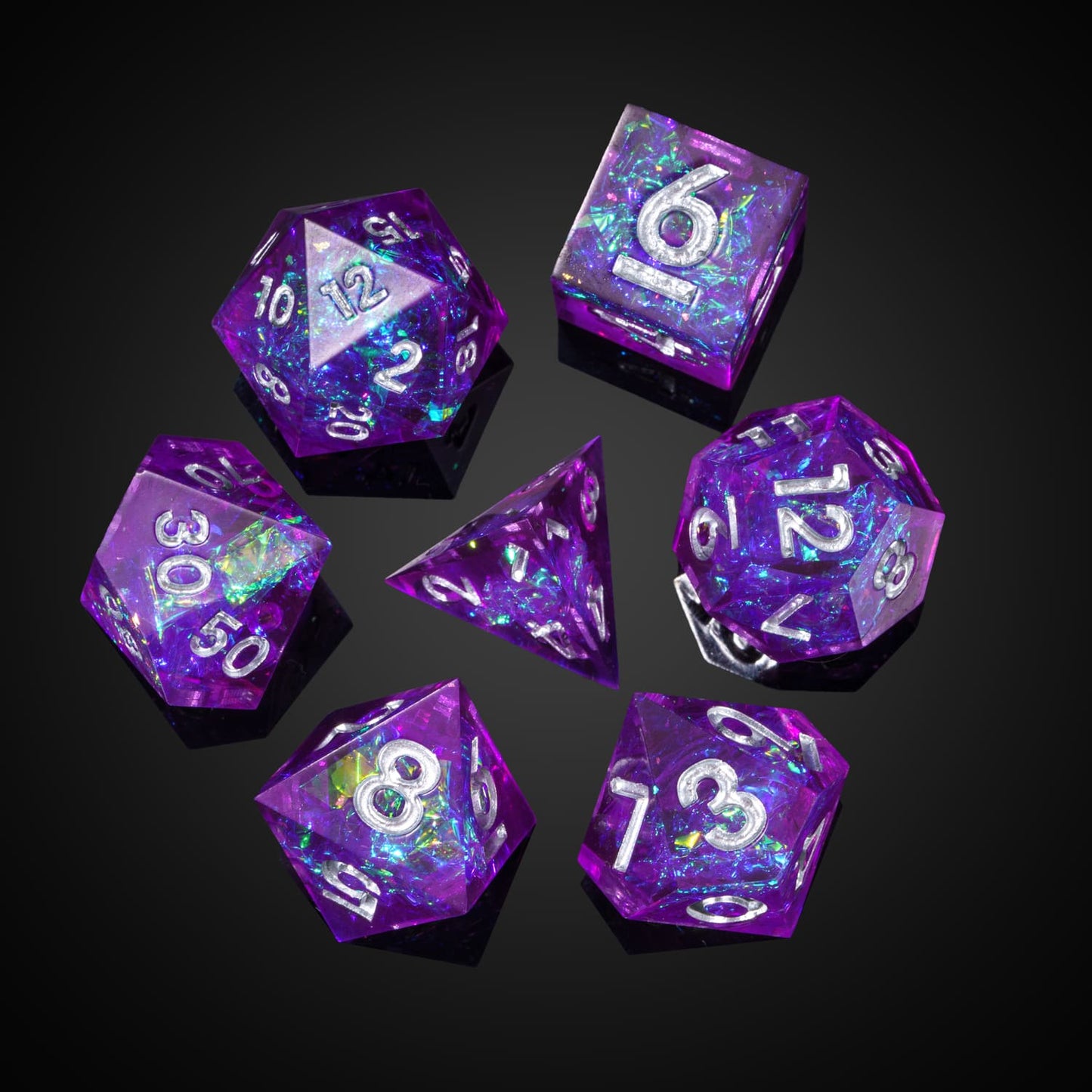 Flat lay of Violet Beam sharp edge dice set featuring swirled violet resin and silver numbers for DnD
