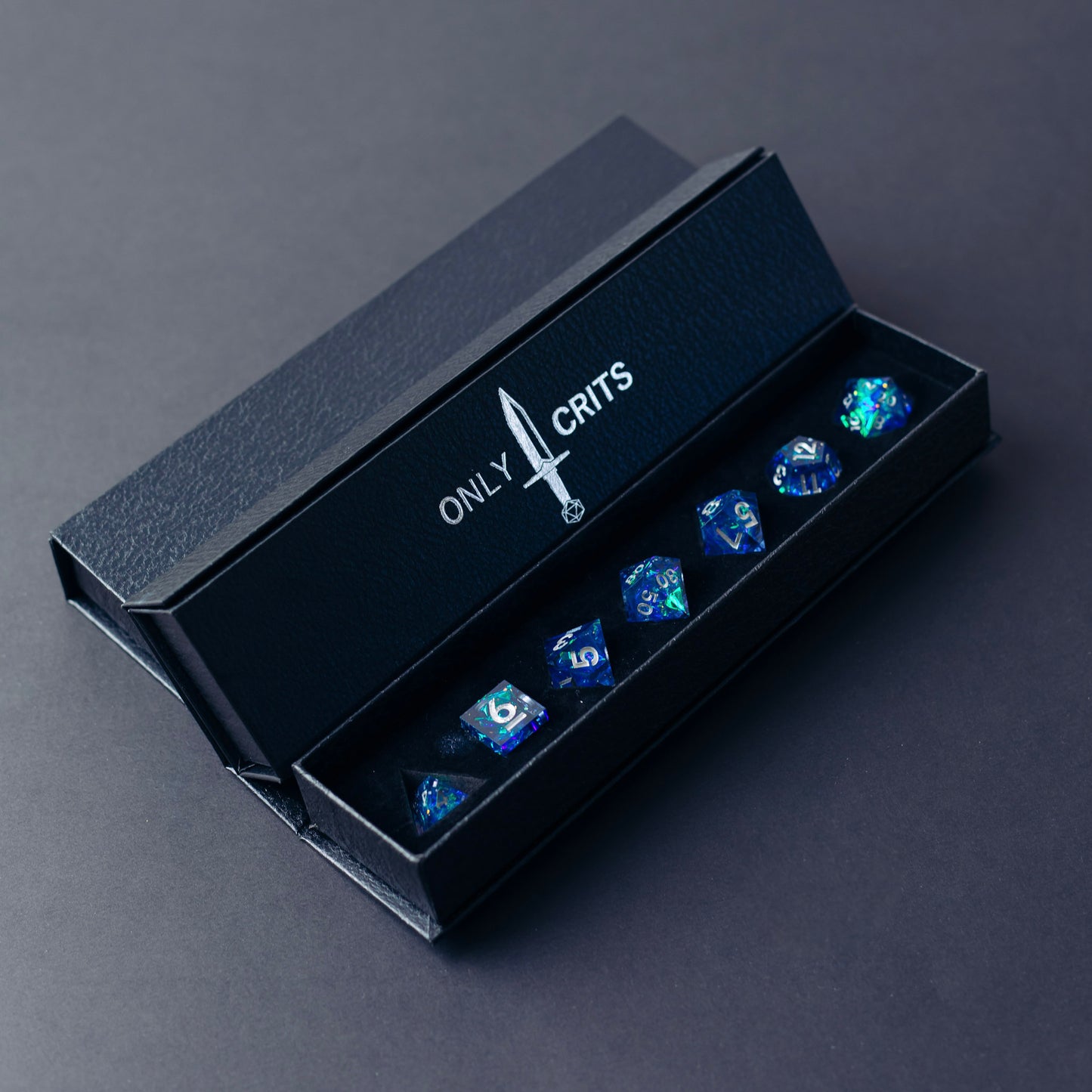 aquamarine shore sharp edged dice set in complementary only crits dice box