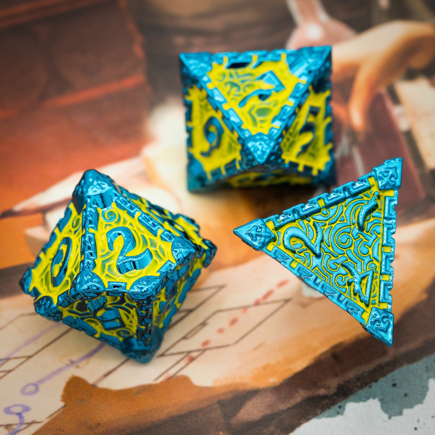 d4, d10 and d8 metal dice, green with blue edges and numbers