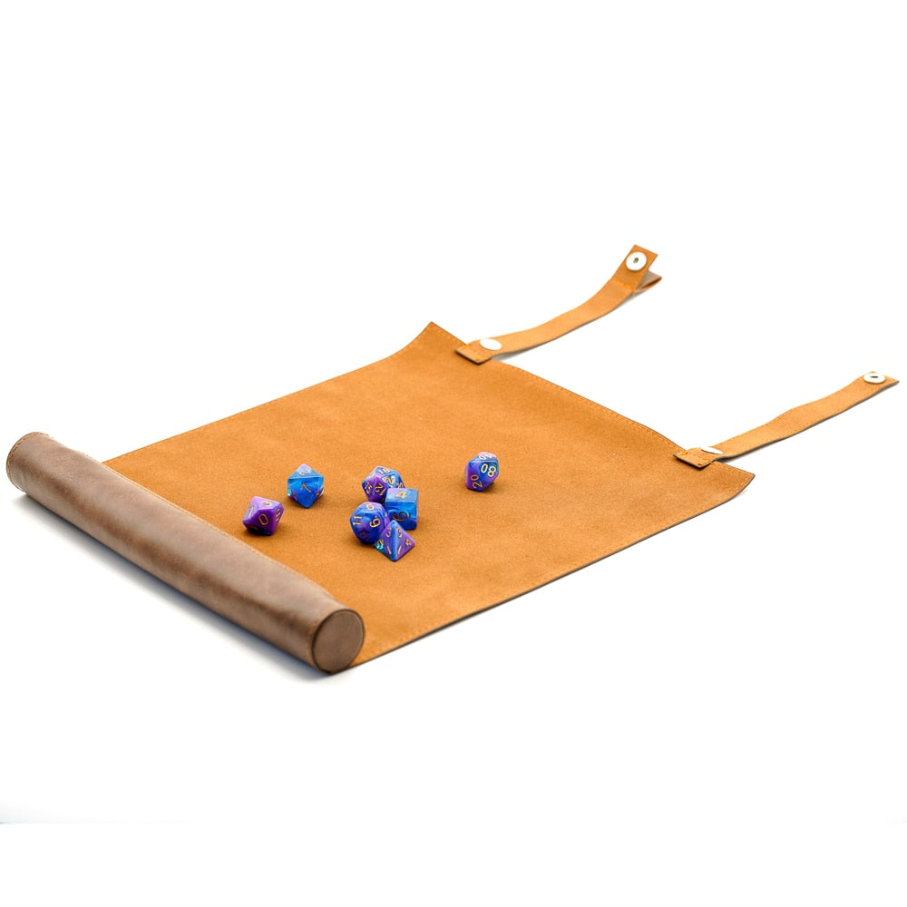 dice sitting on top of unrolled dice tray