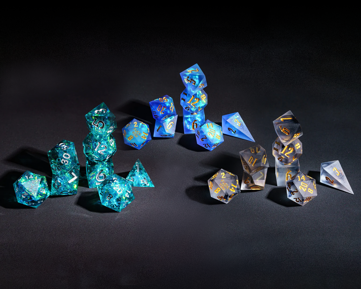 3 8 Piece Sharp Edge Dice Sets. These are options from Only Crits Kickstarter. 