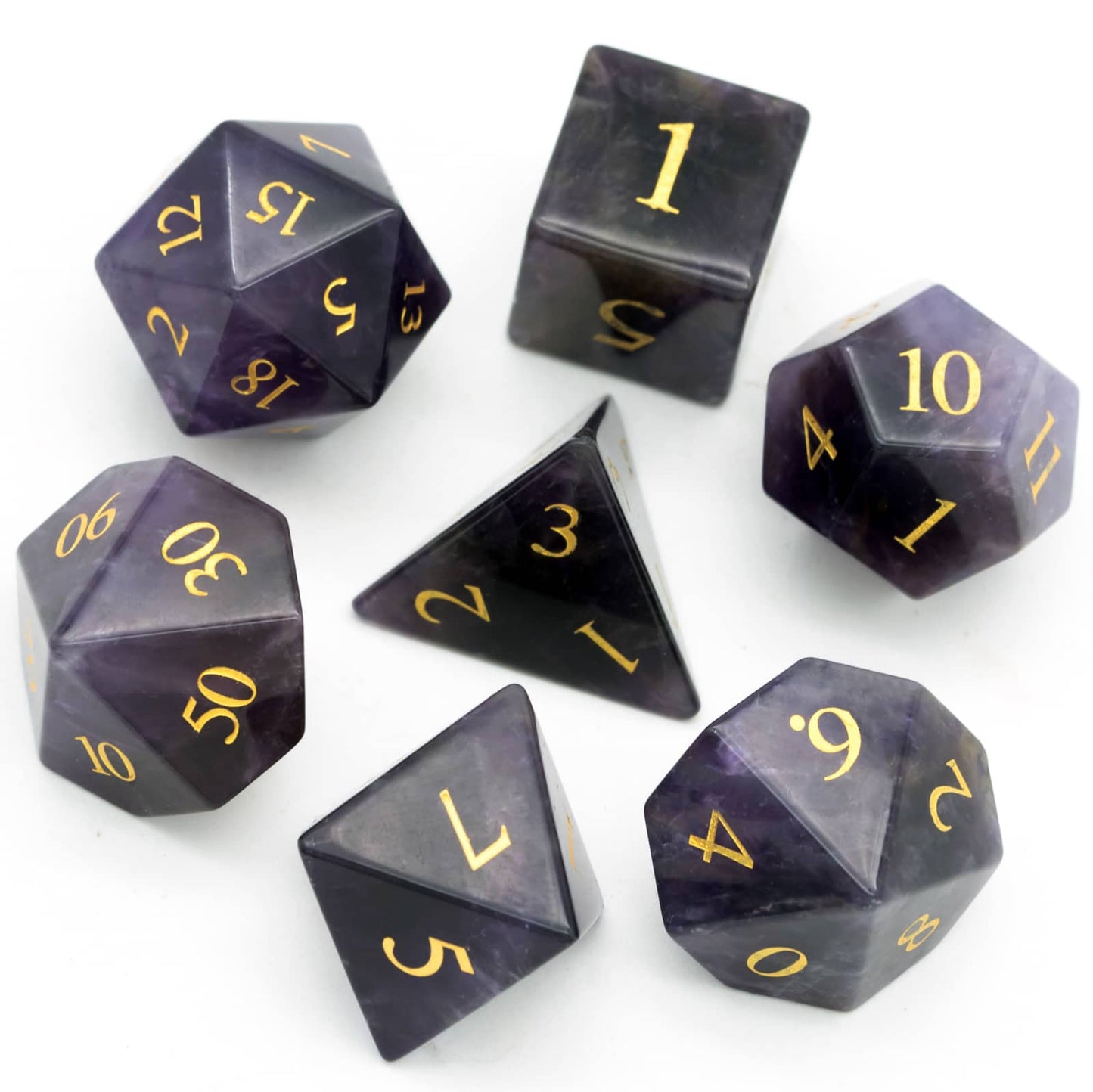 Flat lay of Amethyst Essence Stone Dice Set 7 piece polyhedral dice for DnD 5e and trpg