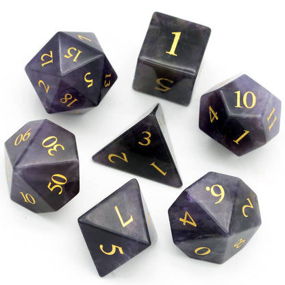 Flat lay of Amethyst Essence Stone Dice Set 7 piece polyhedral dice for DnD 5e and trpg