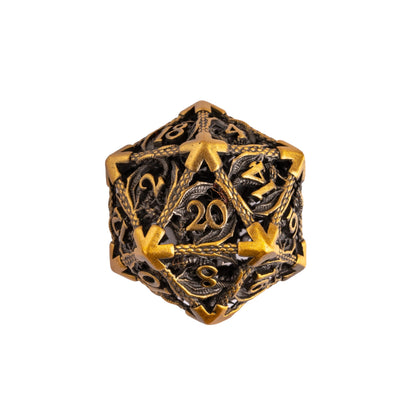 Close up of Ancient Gold Dragon hollow metal D20 featuring intricate dragon scale detailing with antique gold edges and darkened recessed accents