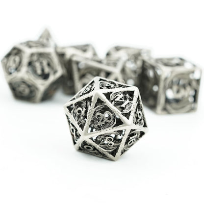 Close-up of hollow metal D20 from Ancient Silver Dragon dice set for fantasy DND and TTRPG games
