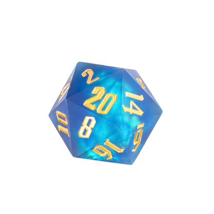 Close up of Azure Abyss Sharp Edge D20 featuring ocean blue resin with iridescent shimmer and gold numbering for DnD and tabletop RPGs