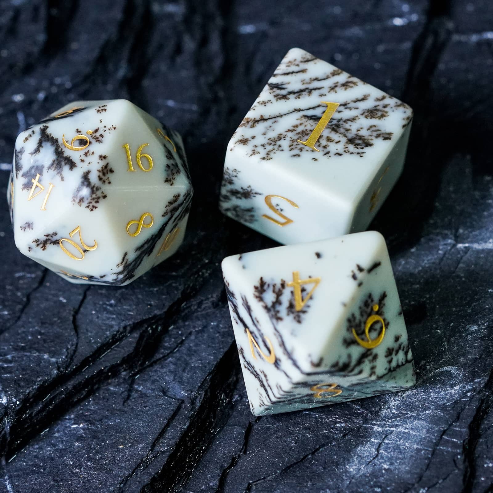 Birch Stonework Stone Dice Set featuring D20 D6 and D8 with brown veining and gold inlays