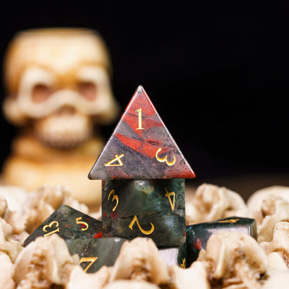 Blood Hex stone d4 for DnD & DnD 5e with skull prop in background