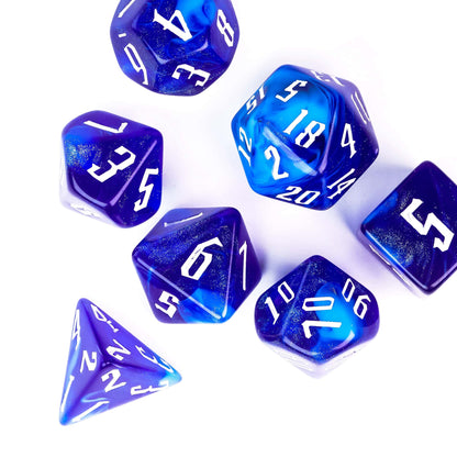 Blue Sapphire polyhedral dice set with blue gradients and white numbers flat lay display