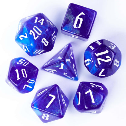 Blue Sapphire seven piece dice set arranged showing white numbering for tabletop games