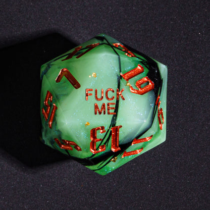 Close up Bog Hag Fuck Me D20 with green resin and red metallic ink