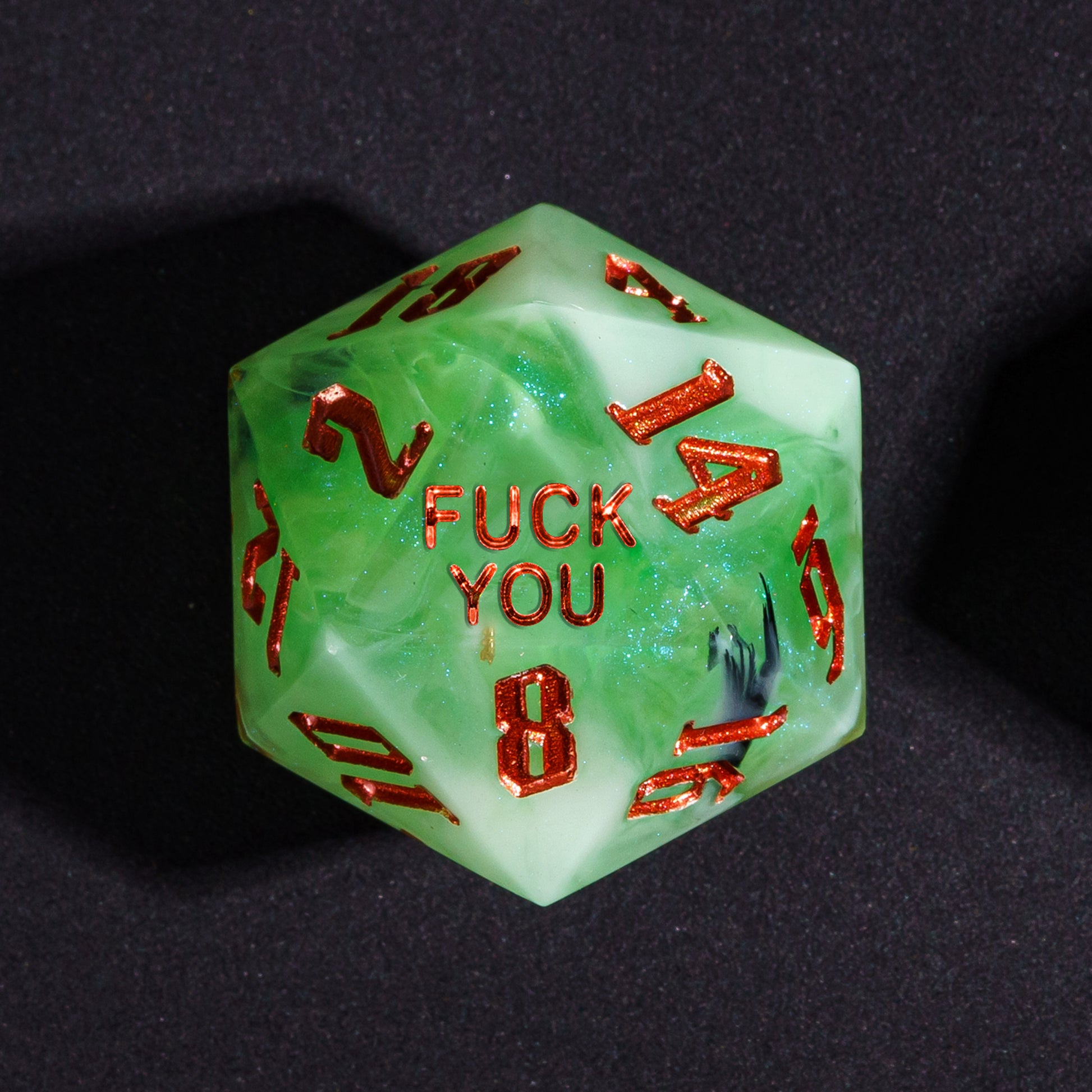 Close up Bog Hag Fuck You D20 with swamp green resin and red numbers