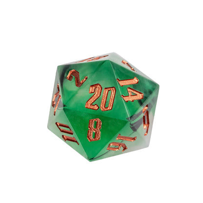 Macro detail of d20 Bog Hag Sharp Edge Dice showing gold foil accents in green resin