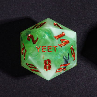 Close up Bog Hag Yeet D20 with green resin and red metallic numbers