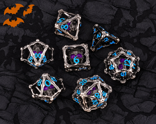 Bone Cage metal DnD dice set with silver bone frames, skulls with violet eyes inside, and blue numbers