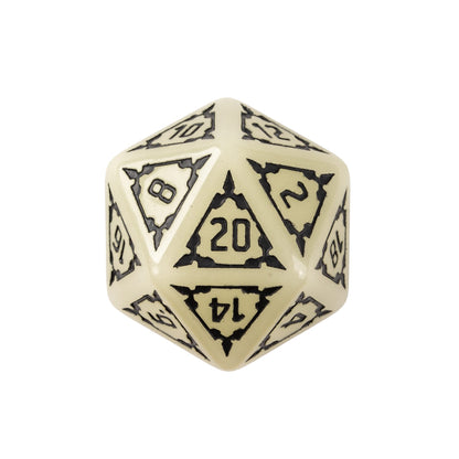 Close up of Castle Glow & Black Chonk D20 resin dice for DnD and tabletop RPGs