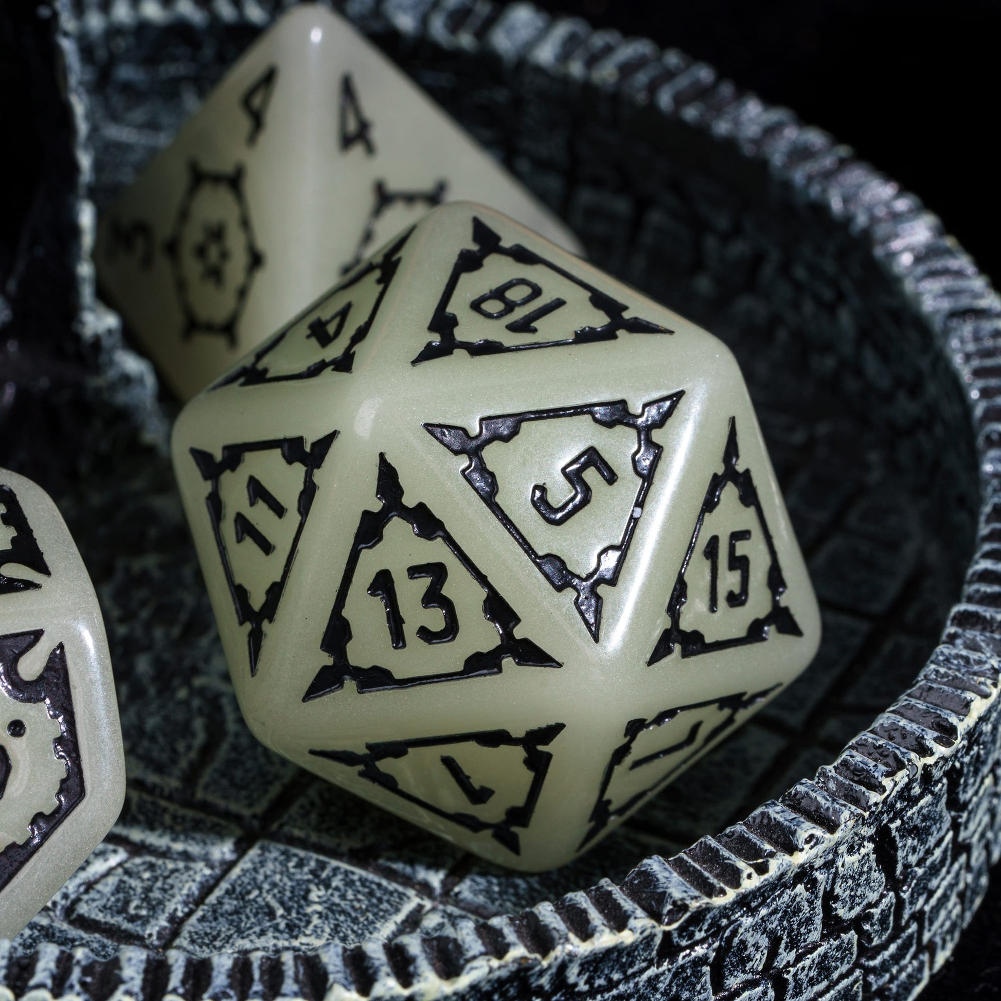 Castle Glow & Black Huge Dice Set closeup of D20 with ornate black numbering for DnD & DnD 5e