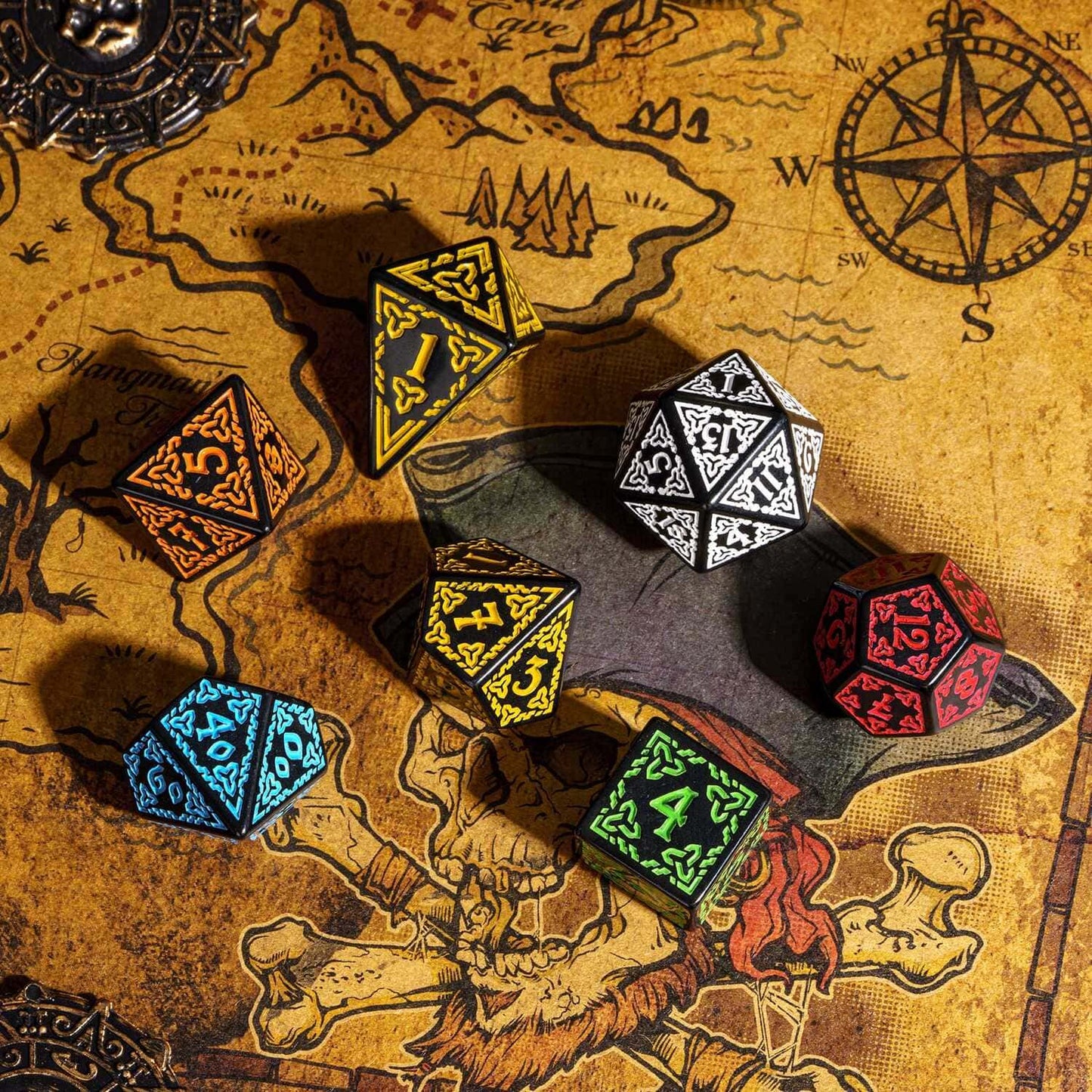 Mixed Celtic Knot Dice Sets in red, yellow, green, blue, orange & white displayed on fantasy map, dice for DND & DND 5e