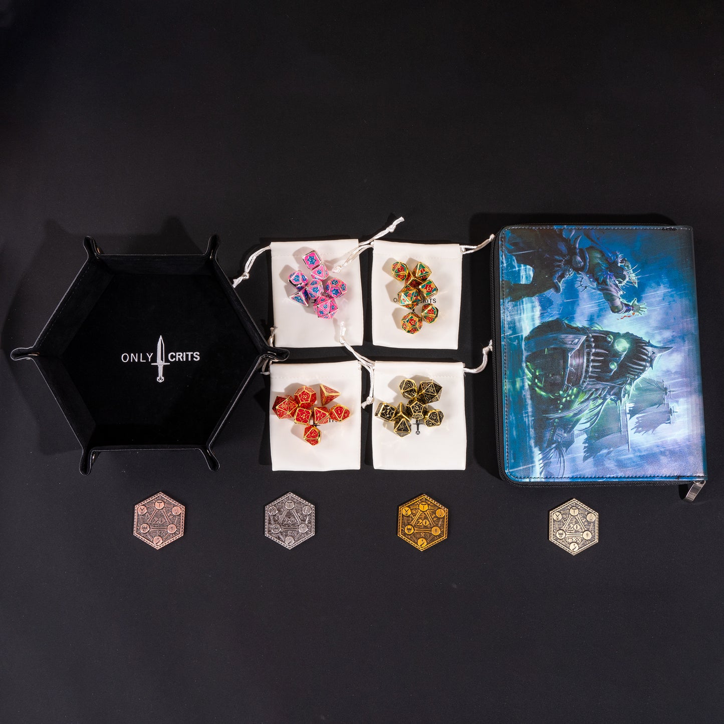 Collector's Chroma Dice Bundle arranged with four Chroma metal dice sets, premium dice binder, hexagonal dice tray, four dice bags, and collectible inspiration coins