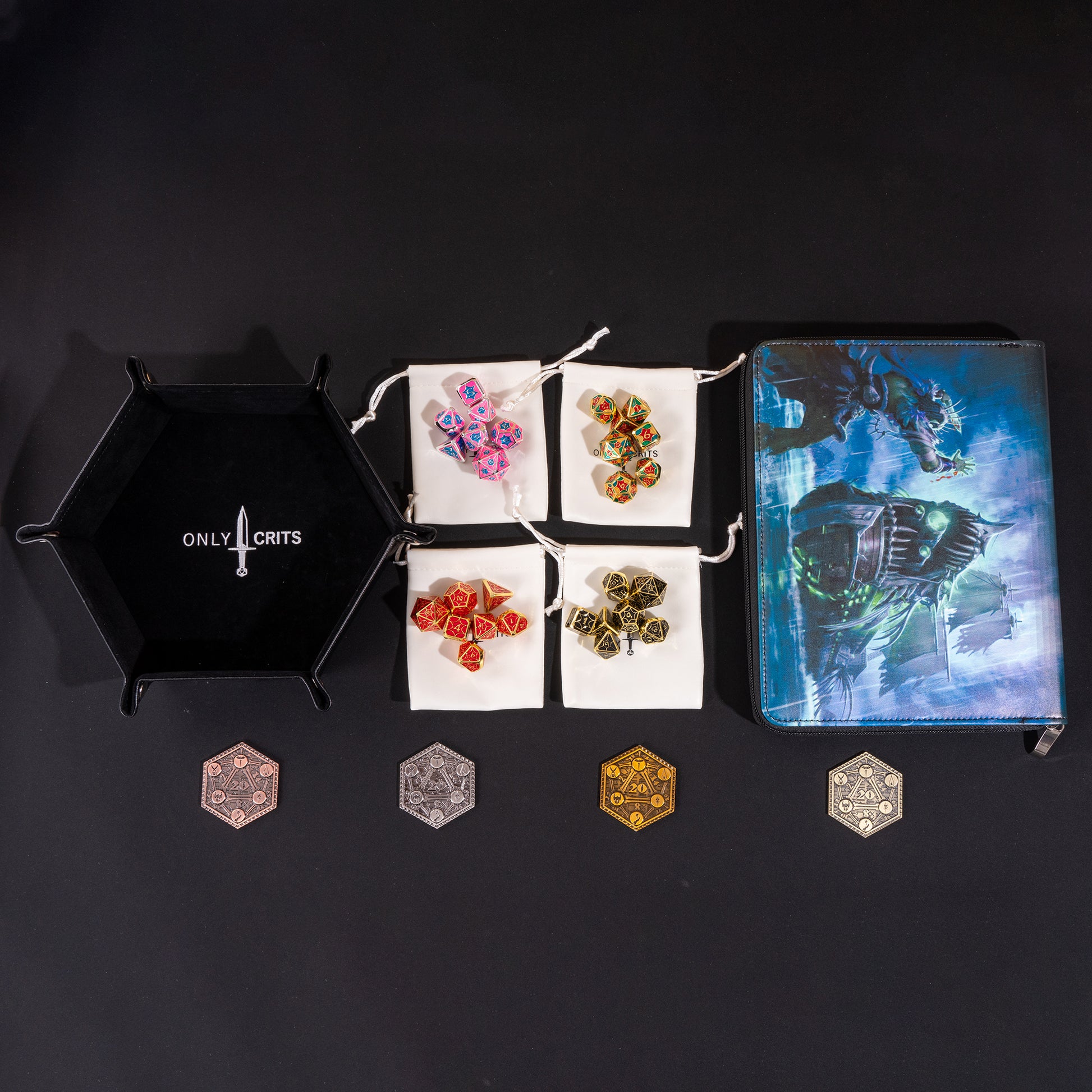 Collector's Chroma Dice Bundle arranged with four Chroma metal dice sets, premium dice binder, hexagonal dice tray, four dice bags, and collectible inspiration coins
