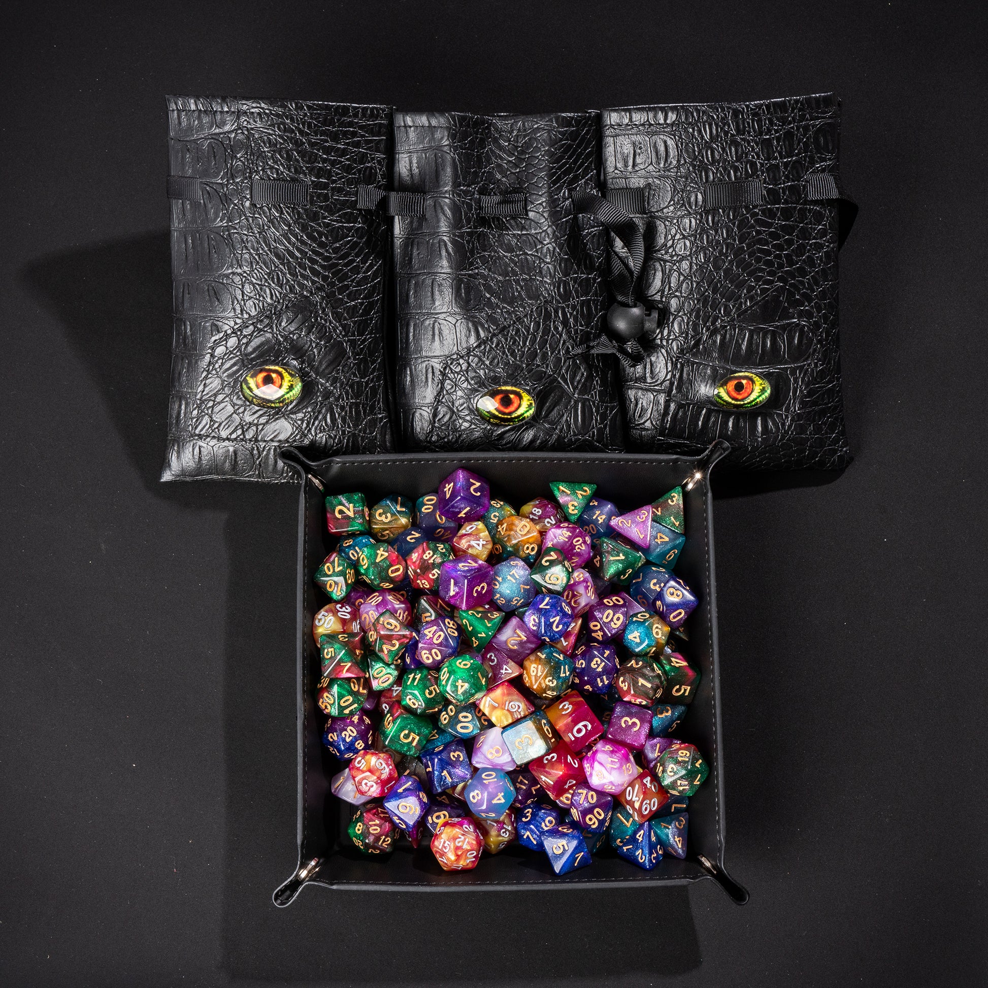Collector's Dragon Eye Dice Bundle with Dragon Eye dice bags and premium dice tray filled with assorted DnD dice for tabletop gaming