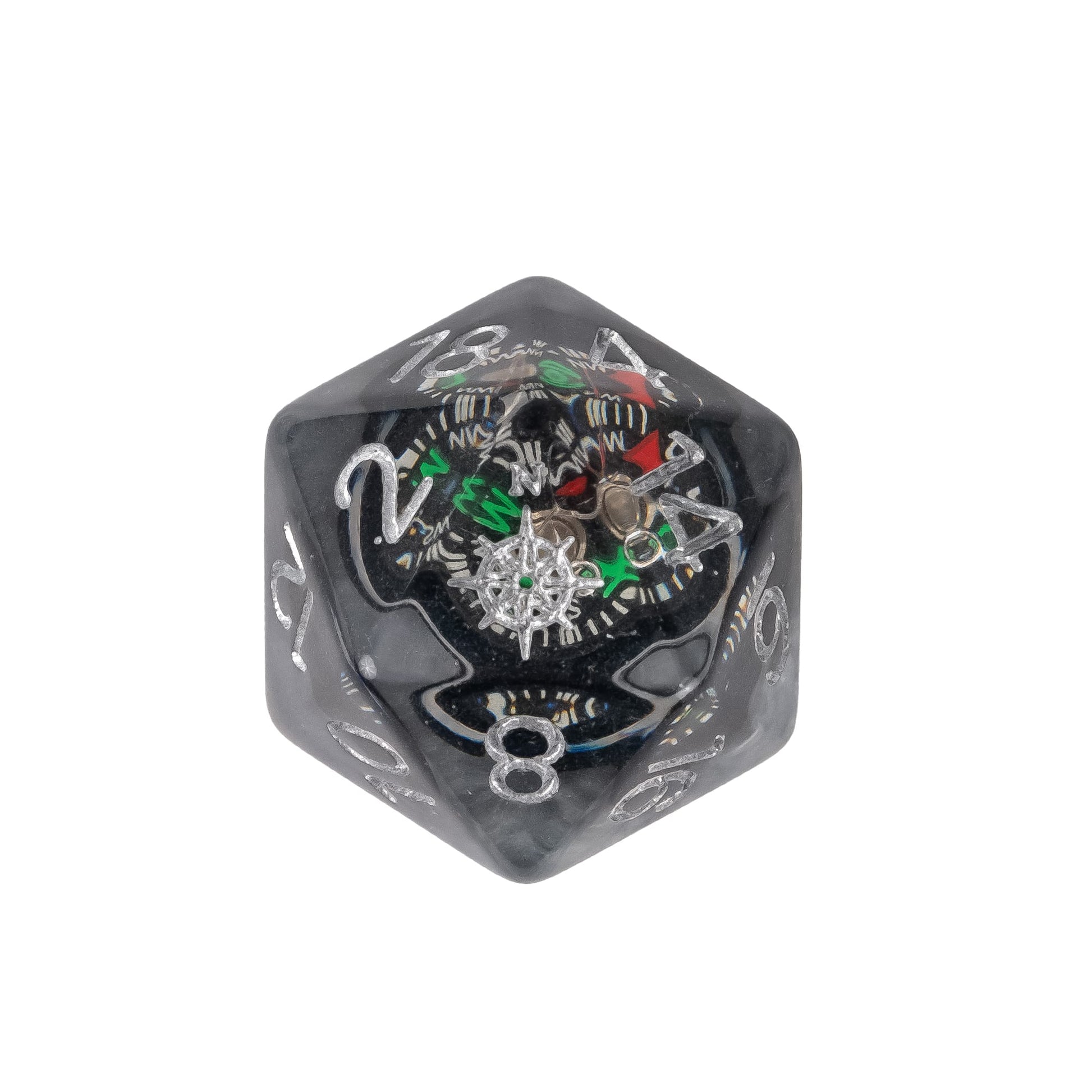 Close up of Compass Core D20 featuring a miniature compass inclusion suspended in smoky clear resin with silver numbering